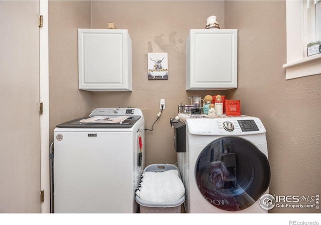 23462 County Road 55, Kersey, CO 80644 - laundry room with cabinet space and independent washer and dryer