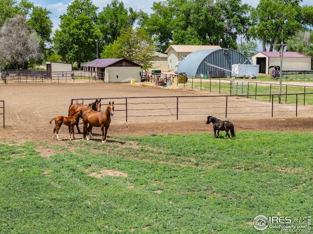 23462 County Road 55, Kersey, CO 80644 - view of community with an enclosed riding area, an outbuilding, an exterior structure, and a rural view