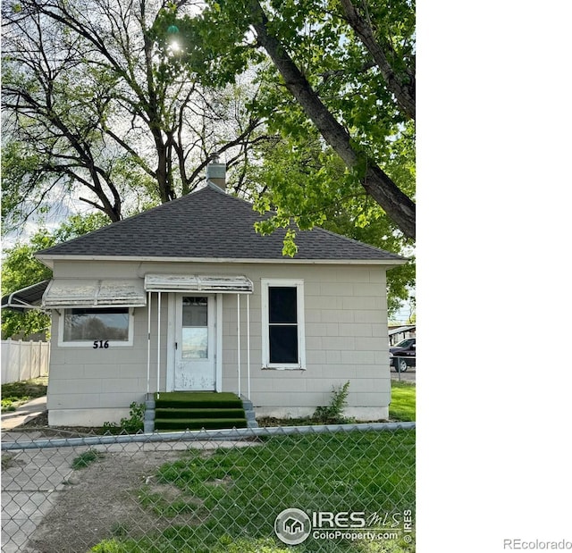 516 Elm Ave, Eaton, CO 80615 - view of front of home with a shingled roof