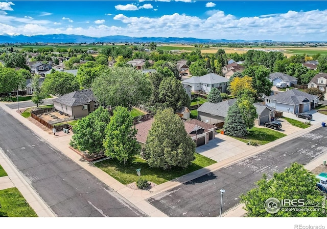 520 N Harding Ave, Johnstown, CO 80534 - aerial perspective of suburban area with a mountainous background