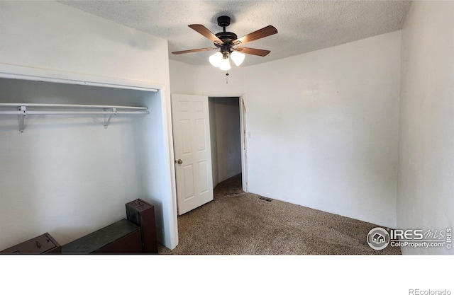 305 Phelps St, Sterling, CO 80751 - unfurnished bedroom with carpet floors, a textured ceiling, and ceiling fan