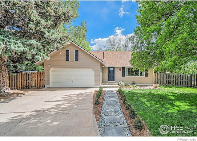 2824 Edinburgh Ct, Fort Collins, CO 80525 - view of front of home with driveway, a garage, and a shingled roof