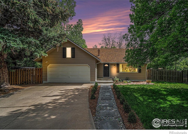 2824 Edinburgh Ct, Fort Collins, CO 80525 - view of front of property with driveway, a garage, and a shingled roof