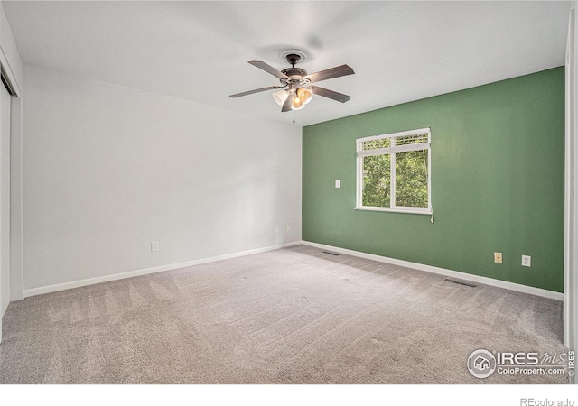 2824 Edinburgh Ct, Fort Collins, CO 80525 - empty room with carpet floors, a ceiling fan, and baseboards