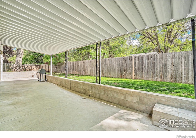 2824 Edinburgh Ct, Fort Collins, CO 80525 - fenced backyard featuring a patio area and area for grilling