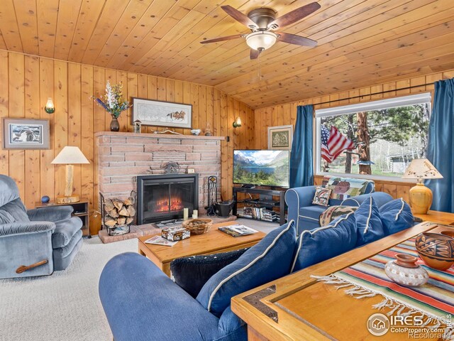 839 Ski Rd, Allenspark, CO 80510 - living room with wooden ceiling, vaulted ceiling, wood walls, a ceiling fan, and carpet flooring