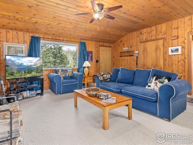 839 Ski Rd, Allenspark, CO 80510 - living area featuring lofted ceiling, carpet flooring, wood walls, a ceiling fan, and wood ceiling