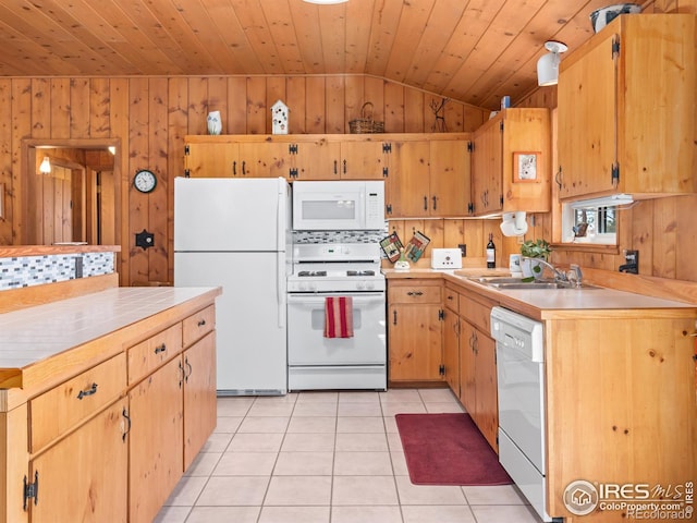 839 Ski Rd, Allenspark, CO 80510 - kitchen with white appliances, a sink, lofted ceiling, light tile patterned flooring, and light countertops
