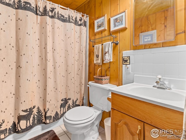 839 Ski Rd, Allenspark, CO 80510 - bathroom with toilet, vanity, tile patterned flooring, and curtained shower