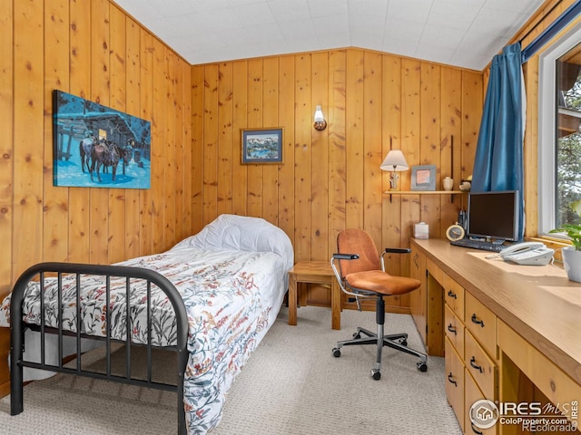 839 Ski Rd, Allenspark, CO 80510 - carpeted bedroom with vaulted ceiling and wooden walls
