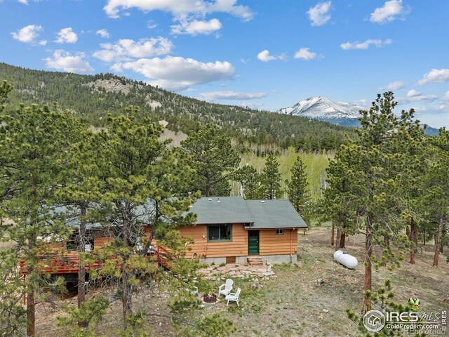 839 Ski Rd, Allenspark, CO 80510 - mountain view with a heavily wooded area