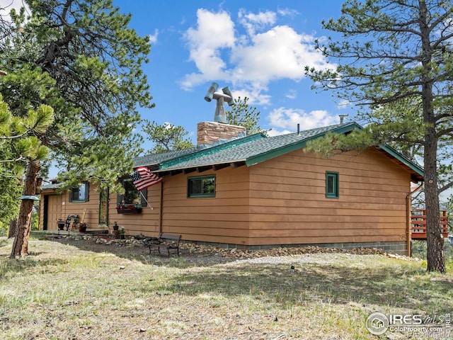 839 Ski Rd, Allenspark, CO 80510 - view of property exterior featuring a chimney