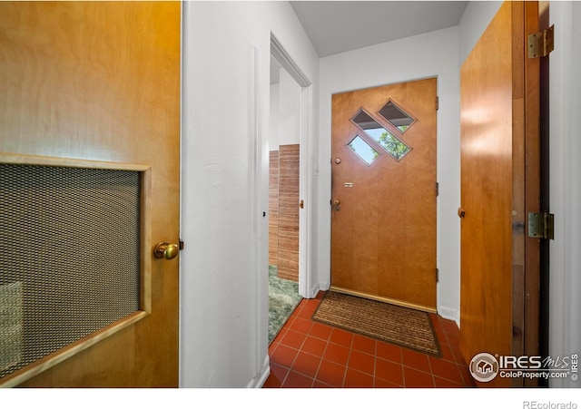 201 Howard St, Brush, CO 80723 - doorway featuring tile patterned flooring