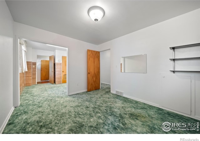 201 Howard St, Brush, CO 80723 - unfurnished bedroom featuring carpet floors and baseboards