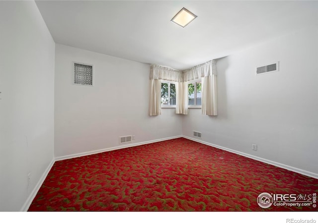 201 Howard St, Brush, CO 80723 - unfurnished room featuring baseboards and carpet floors