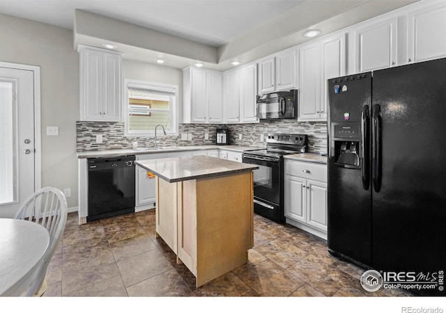 6150 Bluestem Grn, Frederick, CO 80530 - kitchen featuring black appliances, a sink, backsplash, white cabinetry, and recessed lighting