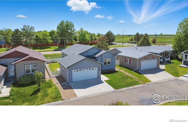 6150 Bluestem Grn, Frederick, CO 80530 - view of front facade with concrete driveway