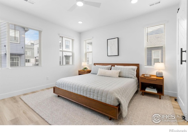 12155 W 57th Pl, Arvada, CO 80002 - bedroom with light wood-style floors, recessed lighting, and a ceiling fan