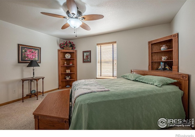631 Linecamp Dr, Livermore, CO 80536 - bedroom featuring carpet flooring, a ceiling fan, and baseboards