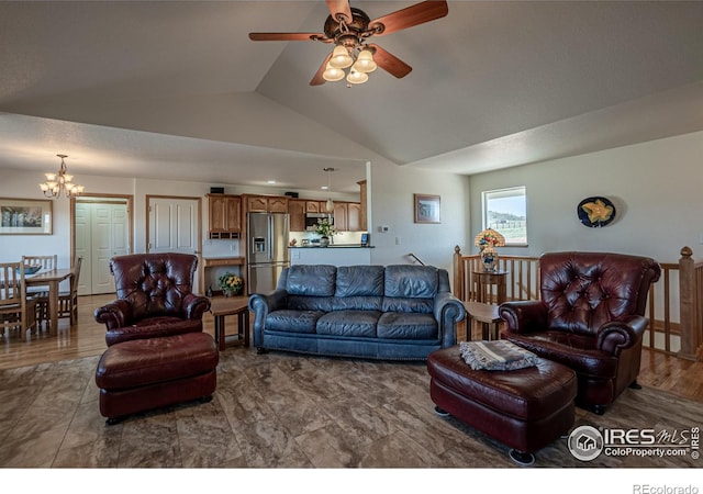 631 Linecamp Dr, Livermore, CO 80536 - living room with a chandelier, lofted ceiling, and ceiling fan