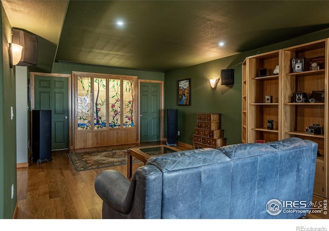 631 Linecamp Dr, Livermore, CO 80536 - living area featuring wood finished floors and recessed lighting