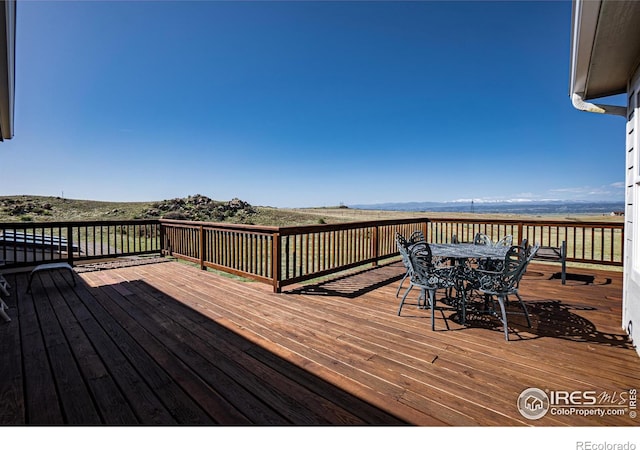 631 Linecamp Dr, Livermore, CO 80536 - wooden terrace with outdoor dining area