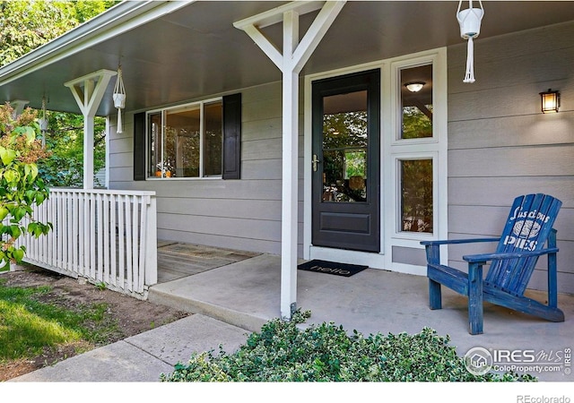 1359 Caledonia Cir, Louisville, CO 80027 - view of exterior entry with a porch