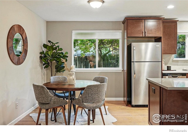 1359 Caledonia Cir, Louisville, CO 80027 - dining room with light wood-style floors, baseboards, and recessed lighting