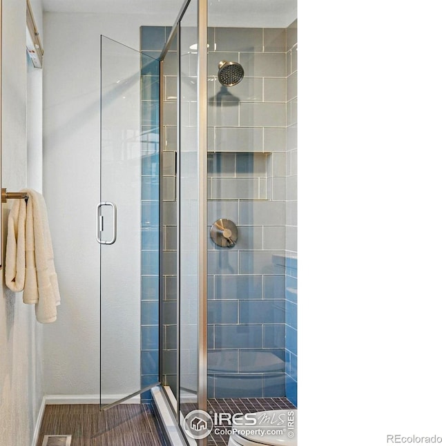 1359 Caledonia Cir, Louisville, CO 80027 - bathroom featuring a shower stall and baseboards