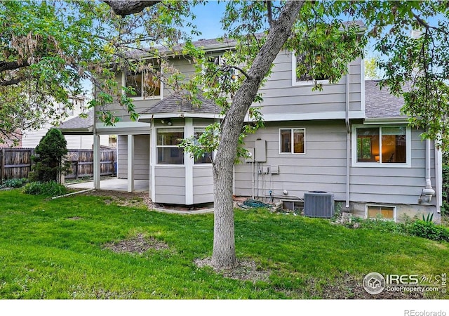 1359 Caledonia Cir, Louisville, CO 80027 - rear view of property with a patio, cooling unit, and roof with shingles