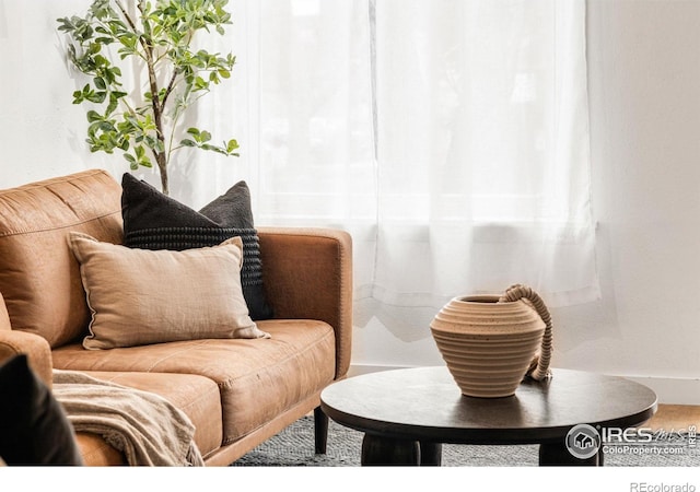 135 E 8th Ave, Denver, CO 80203 - sitting room featuring baseboards