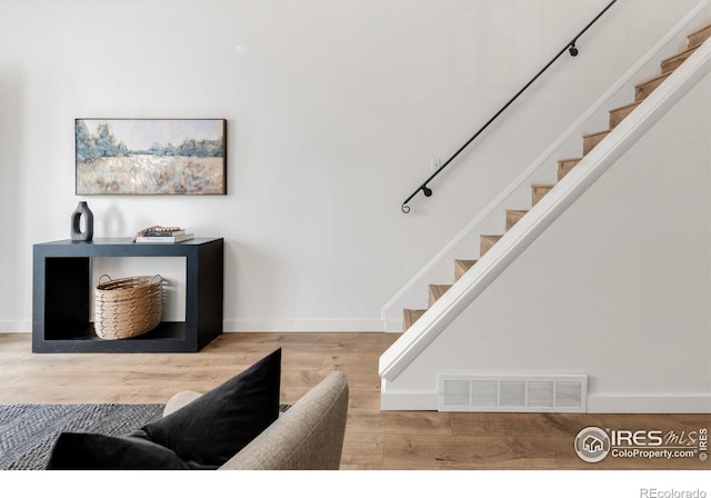 135 E 8th Ave, Denver, CO 80203 - stairs with wood finished floors and baseboards