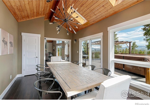 61 County Road 8501, Tabernash, CO 80478 - dining area featuring a chandelier, baseboards, dark wood finished floors, and wood ceiling