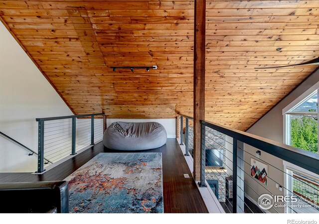 61 County Road 8501, Tabernash, CO 80478 - bedroom featuring wood ceiling, vaulted ceiling, hardwood / wood-style floors, and rail lighting