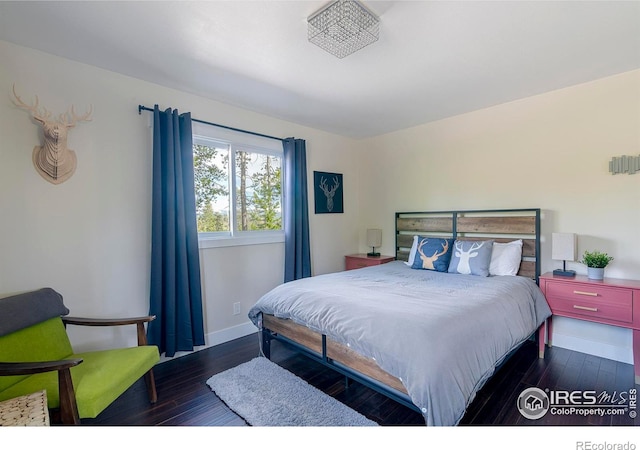 61 County Road 8501, Tabernash, CO 80478 - bedroom with wood finished floors and baseboards