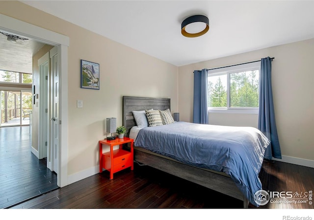 61 County Road 8501, Tabernash, CO 80478 - bedroom featuring baseboards and wood finished floors
