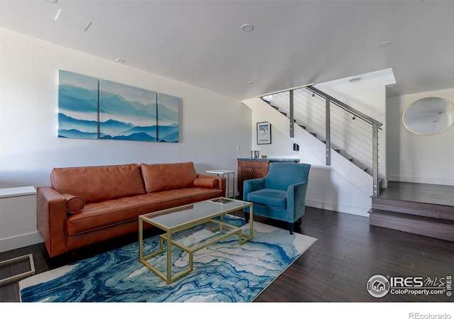 61 County Road 8501, Tabernash, CO 80478 - living area featuring stairway, wood finished floors, and baseboards