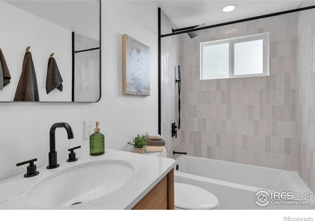 4658 Ingram Ct, Boulder, CO 80305 - bathroom featuring toilet, vanity, and bathing tub / shower combination