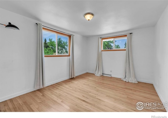 4658 Ingram Ct, Boulder, CO 80305 - empty room featuring wood finished floors and baseboards