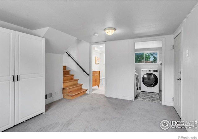 4658 Ingram Ct, Boulder, CO 80305 - laundry room featuring independent washer and dryer, carpet flooring, and baseboards