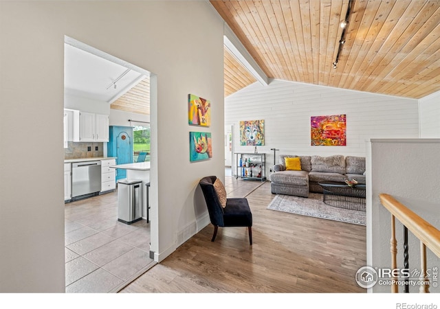 1921 Glenview Ct, Berthoud, CO 80513 - living area with wood ceiling, light wood-type flooring, and baseboards