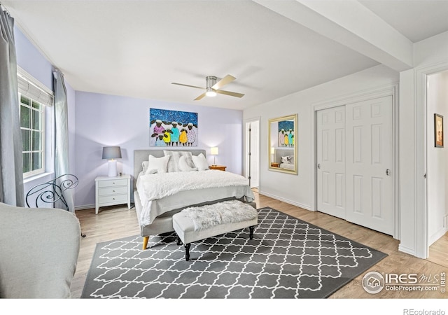 1921 Glenview Ct, Berthoud, CO 80513 - bedroom featuring wood finished floors, ceiling fan, baseboards, and a closet