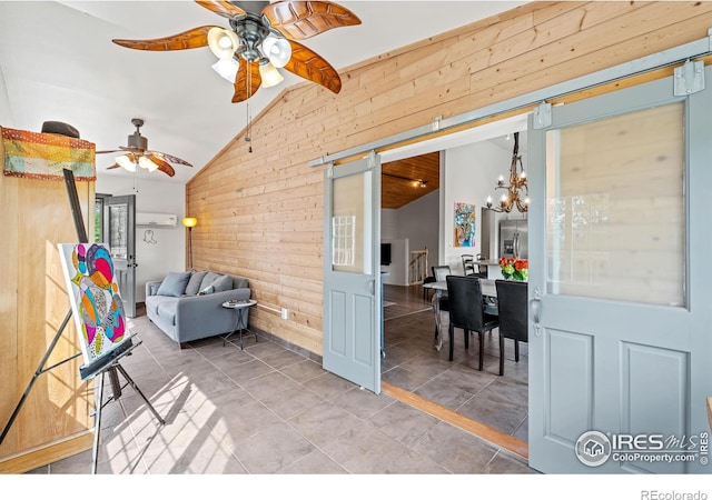 1921 Glenview Ct, Berthoud, CO 80513 - tiled living area featuring wood walls, a ceiling fan, a chandelier, a barn door, and high vaulted ceiling