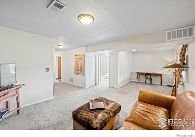 1921 Glenview Ct, Berthoud, CO 80513 - living room featuring carpet flooring, baseboards, and a textured ceiling
