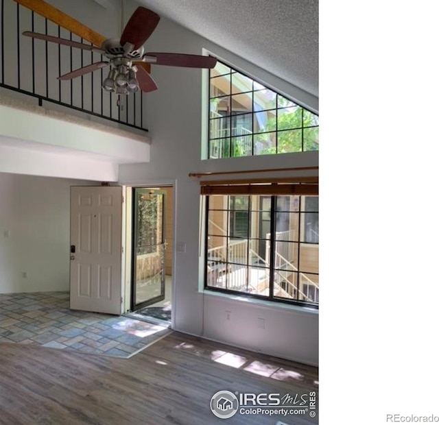 4775 White Rock Cir Unit B, Boulder, CO 80301 - entryway featuring a ceiling fan, high vaulted ceiling, and wood finished floors