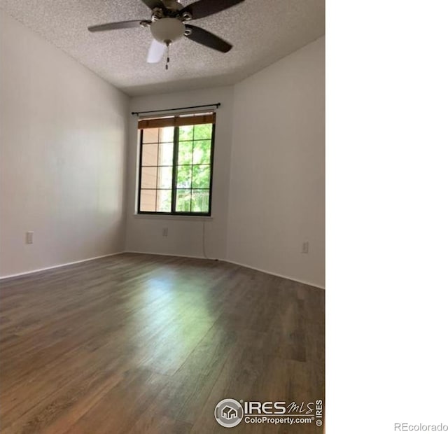 4775 White Rock Cir Unit B, Boulder, CO 80301 - unfurnished room with dark wood-style flooring, a textured ceiling, and a ceiling fan