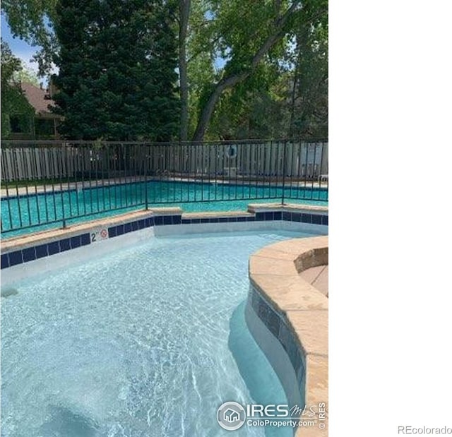 4775 White Rock Cir Unit B, Boulder, CO 80301 - view of pool featuring a pool with connected hot tub