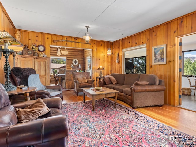 656 Halbach Ln, Estes Park, CO 80517 - living area featuring wood walls and wood finished floors