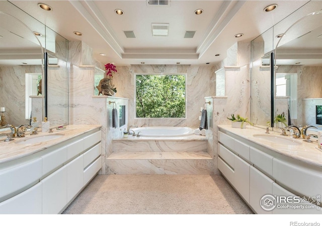 160 Ponderosa Dr, Boulder, CO 80303 - bathroom featuring two vanities, a bath, and recessed lighting