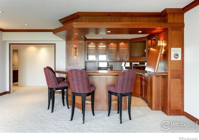 160 Ponderosa Dr, Boulder, CO 80303 - bar with light colored carpet, baseboards, ornamental molding, and recessed lighting